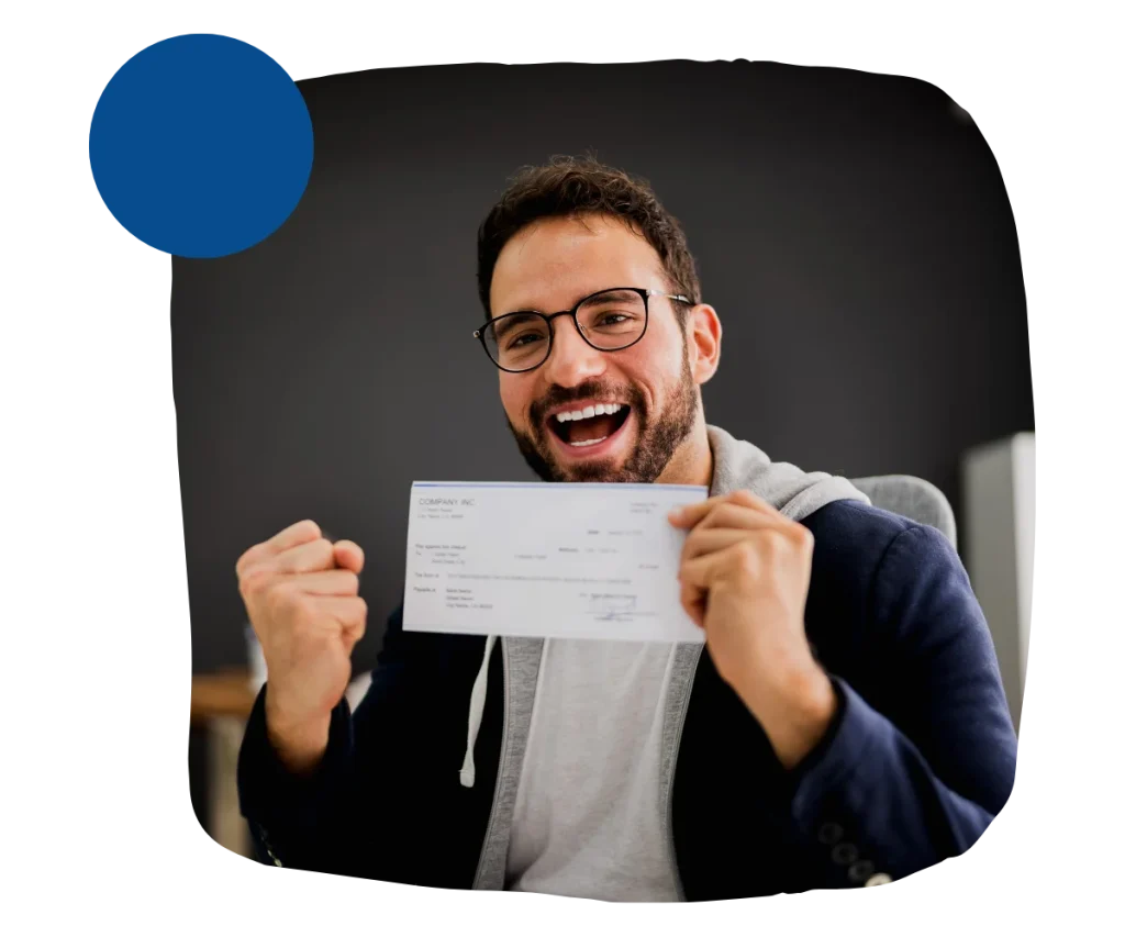 Happy man with a check in his hands